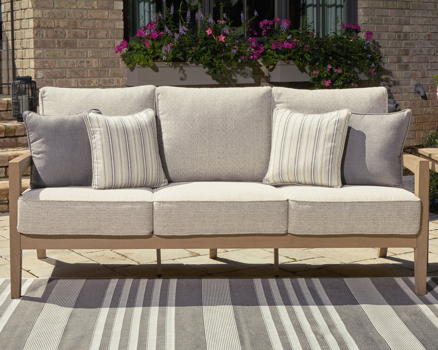 Hallow Creek Driftwood Outdoor Sofa with Cushion