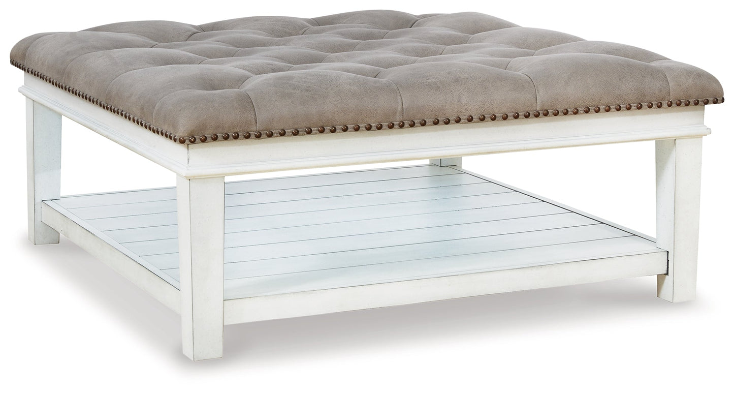 Kanwyn Whitewash Upholstered Ottoman Coffee Table
