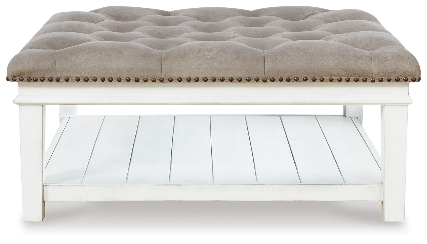 Kanwyn Whitewash Upholstered Ottoman Coffee Table