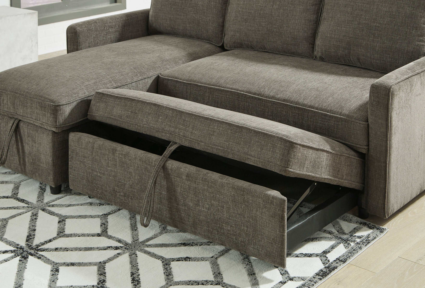 Kerle Charcoal Sectional Sofa w/ Pop-Up Bed