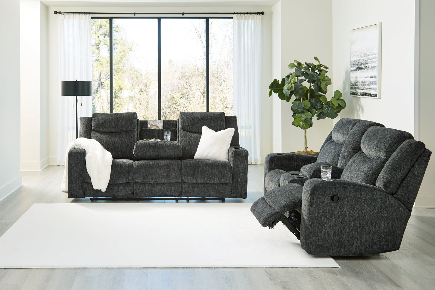 Martinglenn Ebony Reclining Sofa and Loveseat