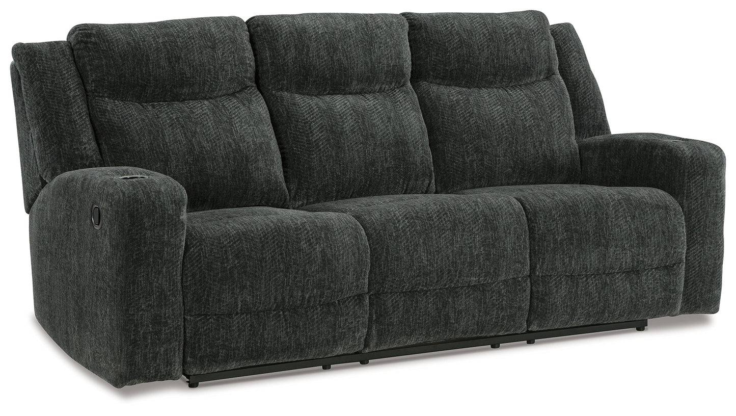 Martinglenn Ebony Reclining Sofa with Drop Down Table