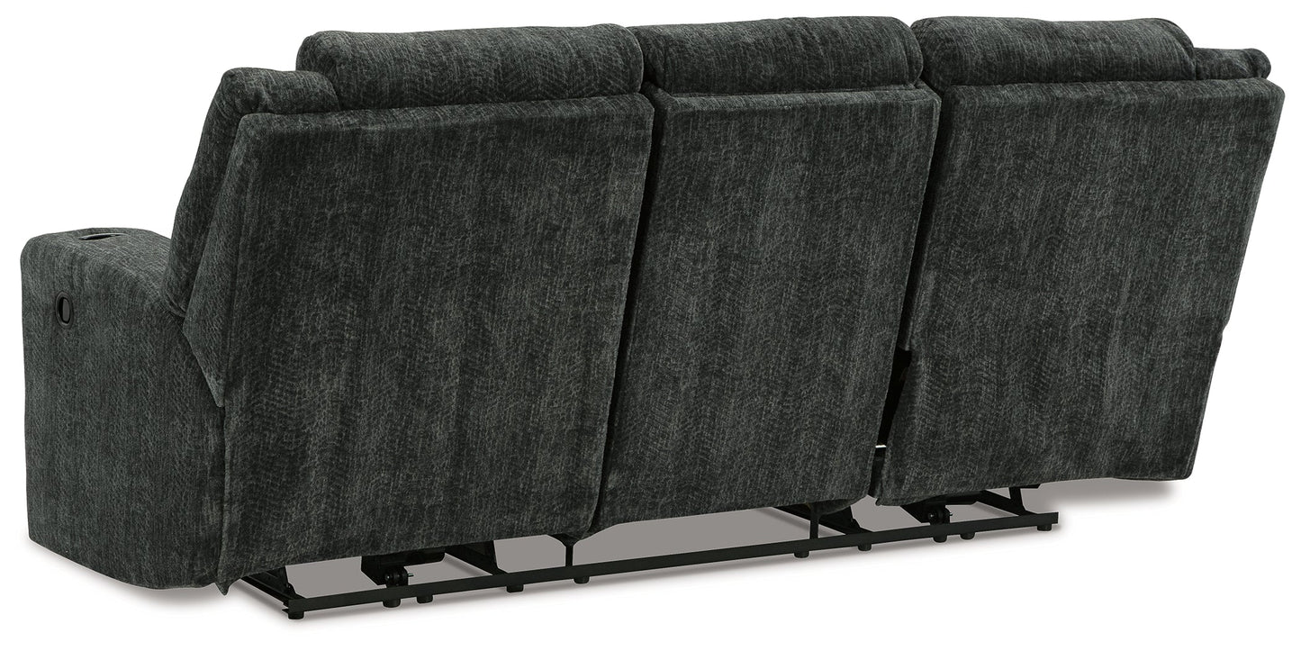 Martinglenn Ebony Reclining Sofa with Drop Down Table