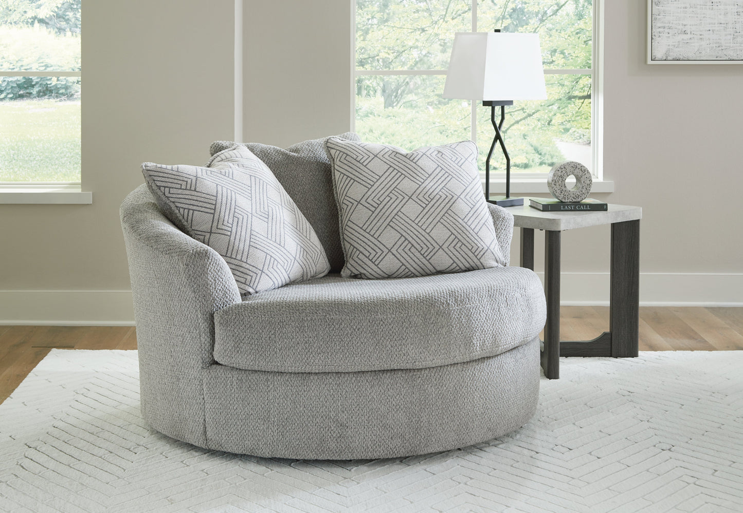 Casselbury Cement Oversized Swivel Chair and Ottoman