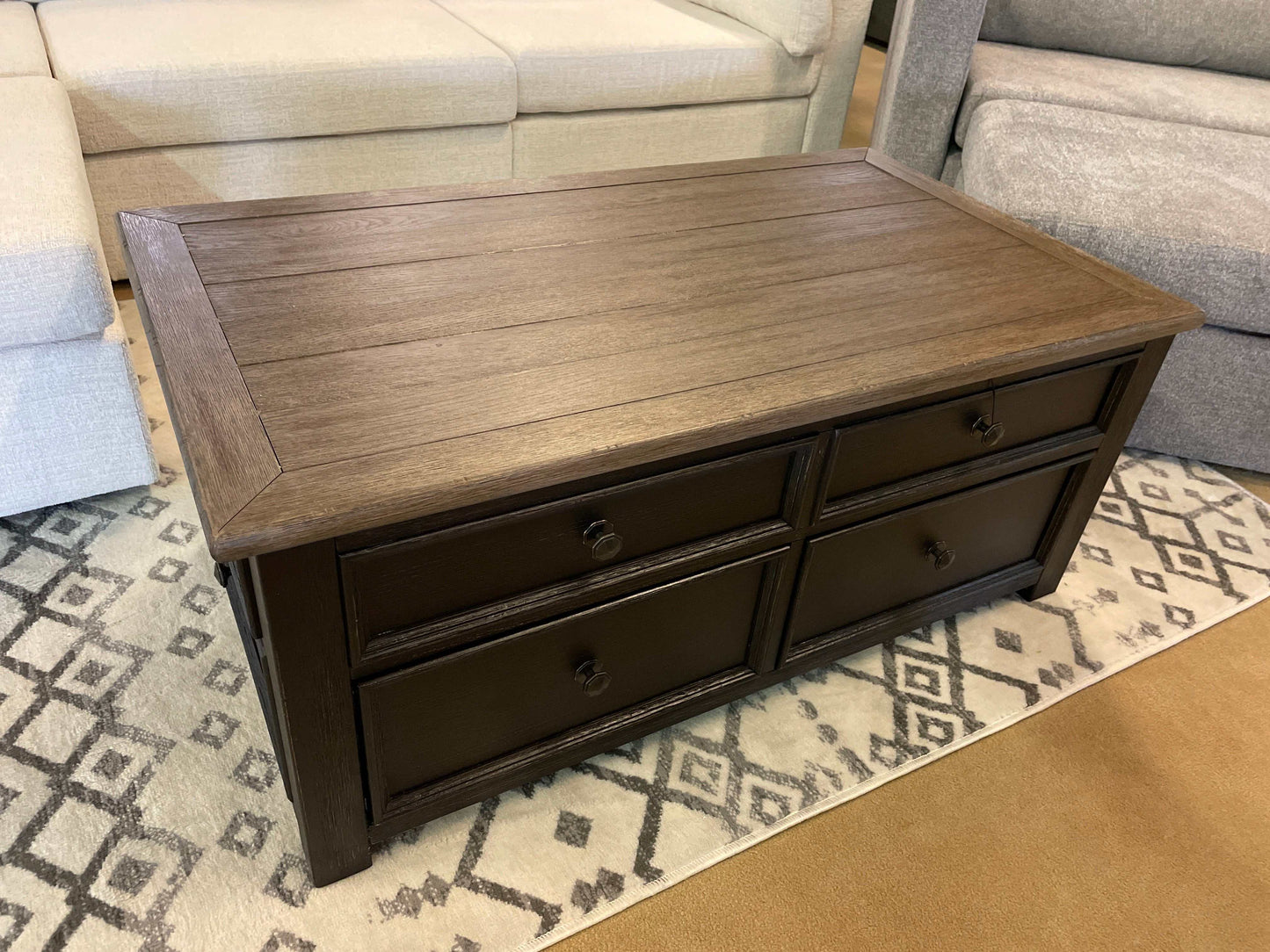 Tyler Creek Grayish Brown/Black Lift Top Coffee Table