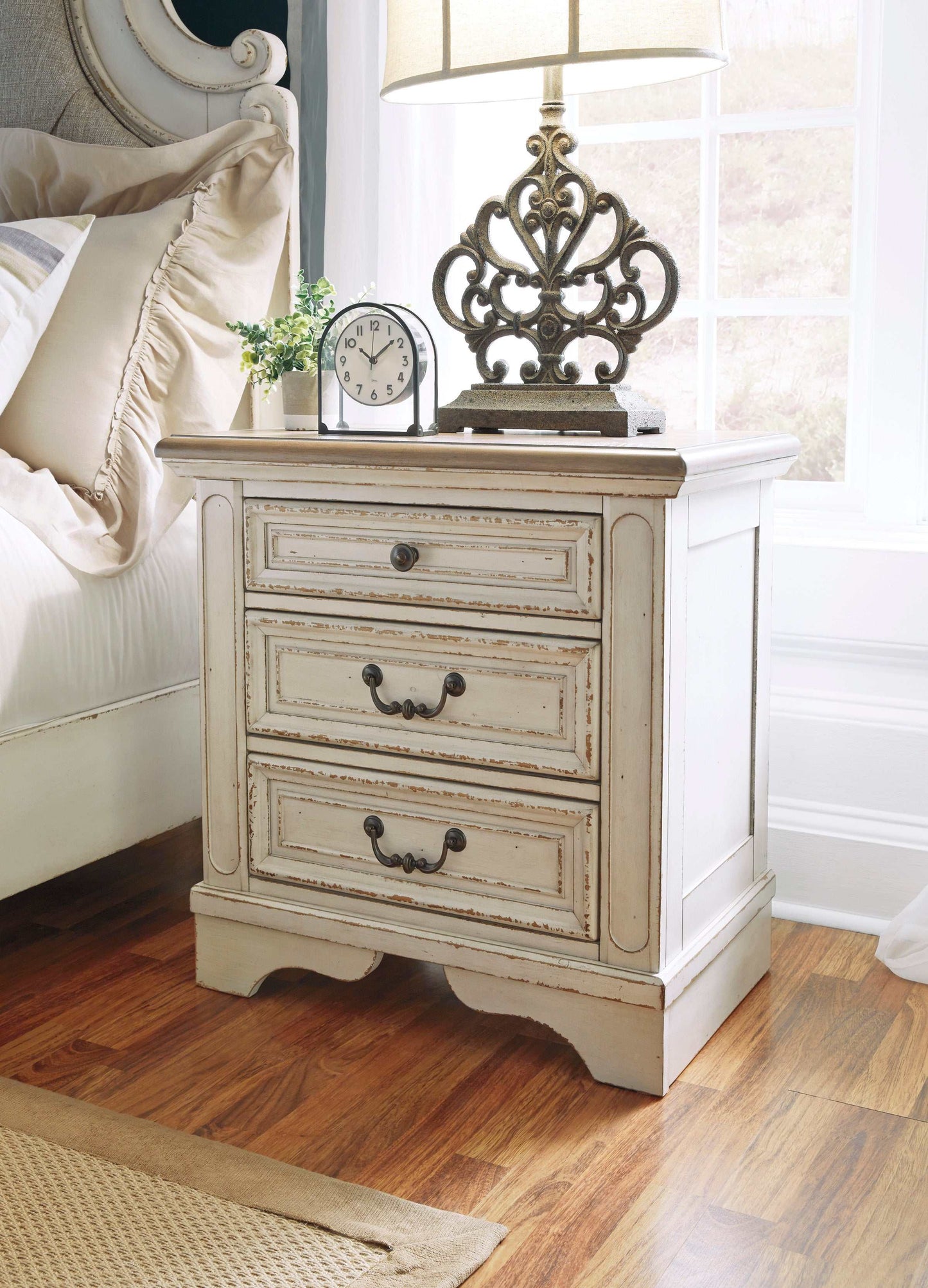 Realyn Nightstand w/ Three Drawer