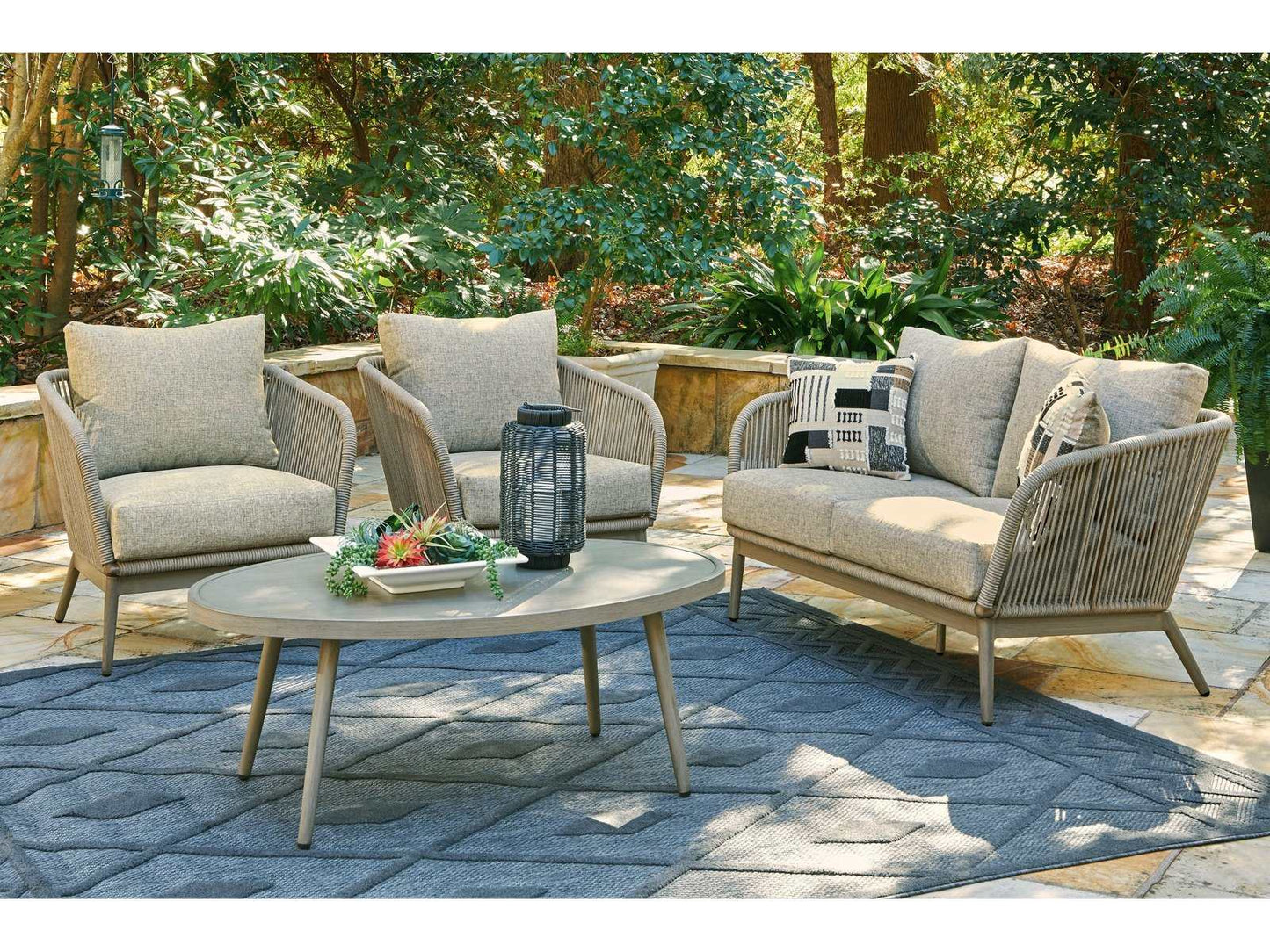 Swiss Valley Beige Oval Outdoor Coffee Table