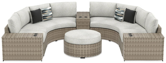 Calworth Beige 7-Piece Outdoor Sectional with Ottoman