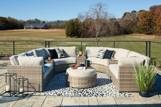 Calworth Beige 8-Piece Outdoor Sectional with Ottoman