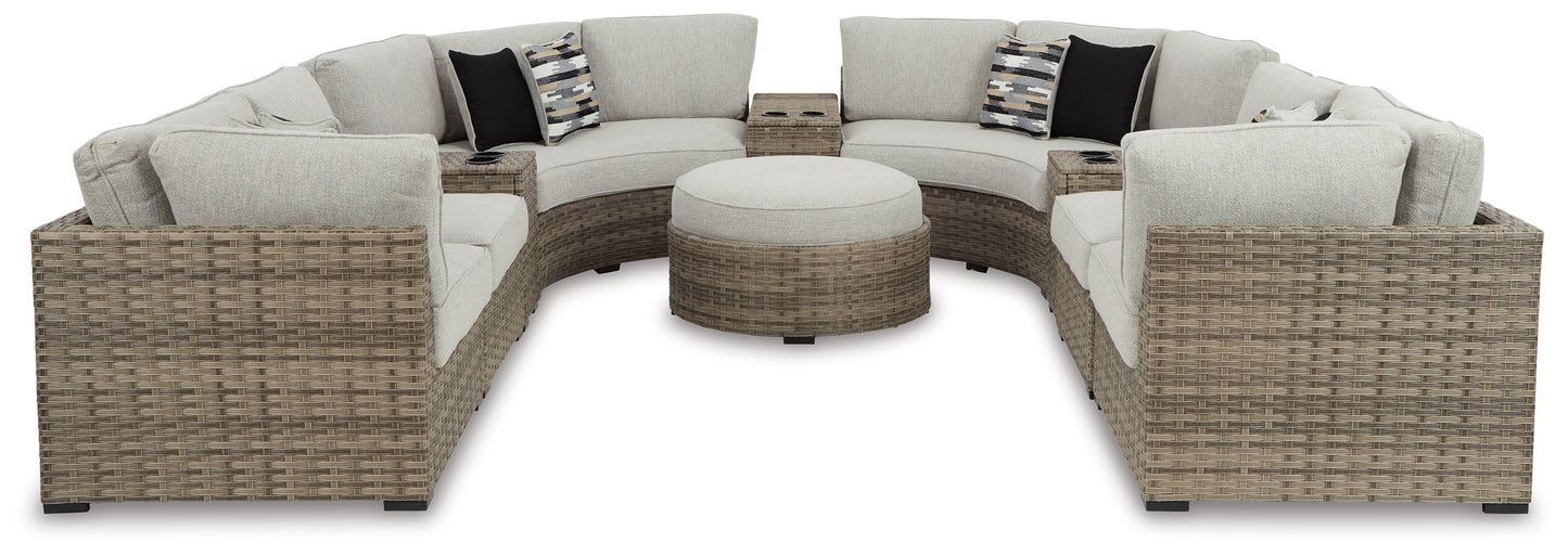 Calworth Beige 8-Piece Outdoor Sectional with Ottoman