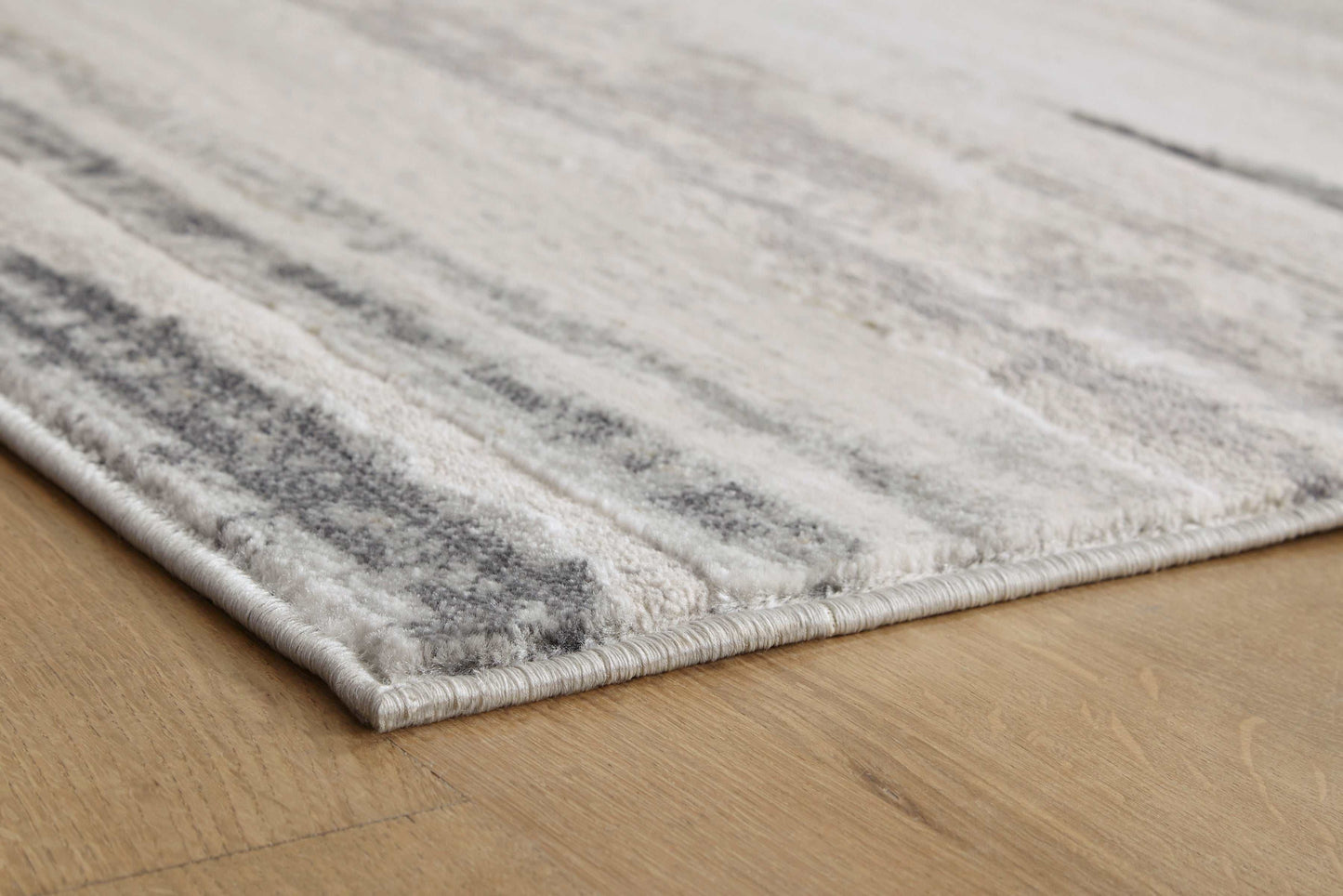 Abanett Cream/Gray Area Rug