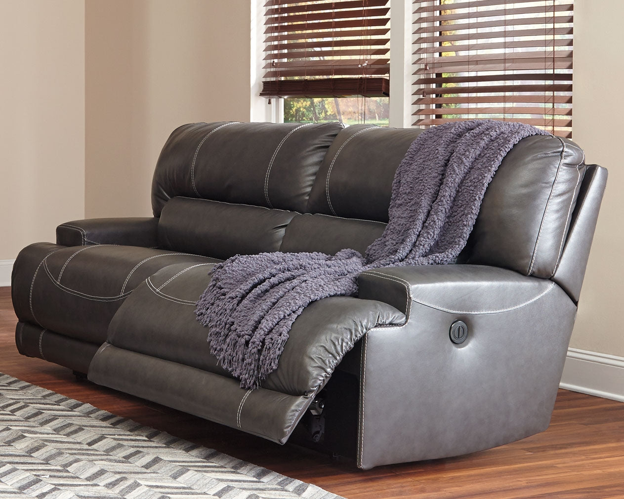 McCaskill Gray Reclining Sofa and Loveseat with Power Recliner