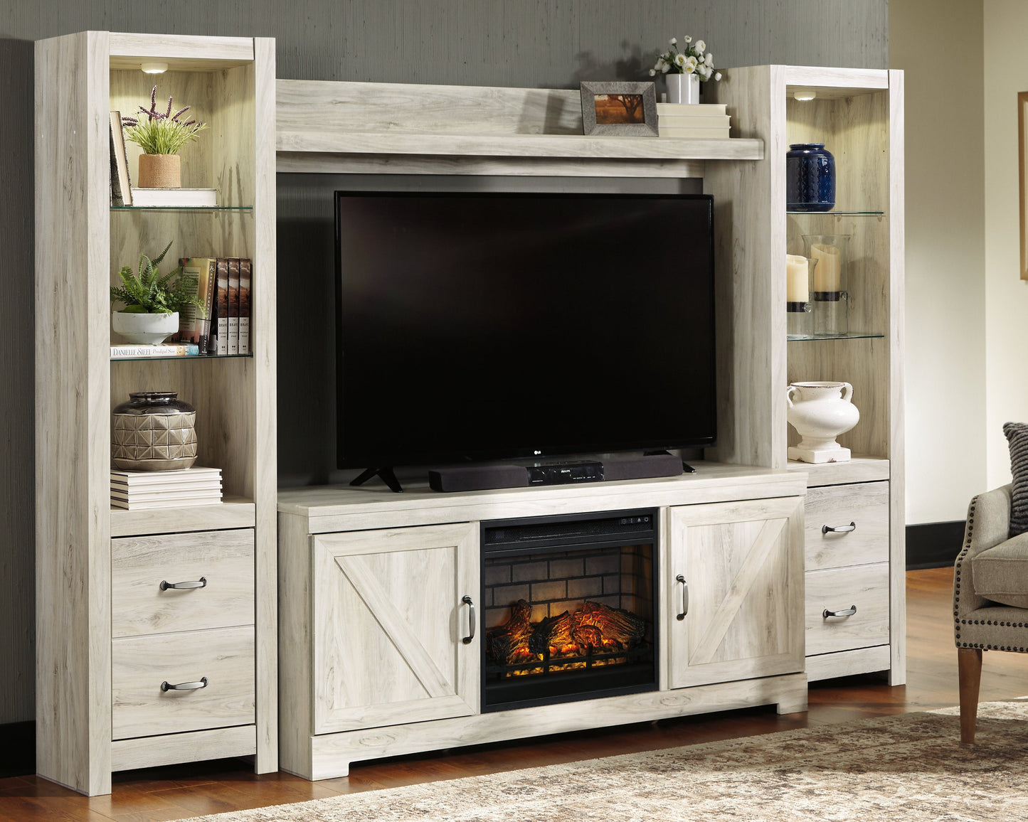 Bellaby Whitewash 4-Piece Entertainment Center with Electric Fireplace