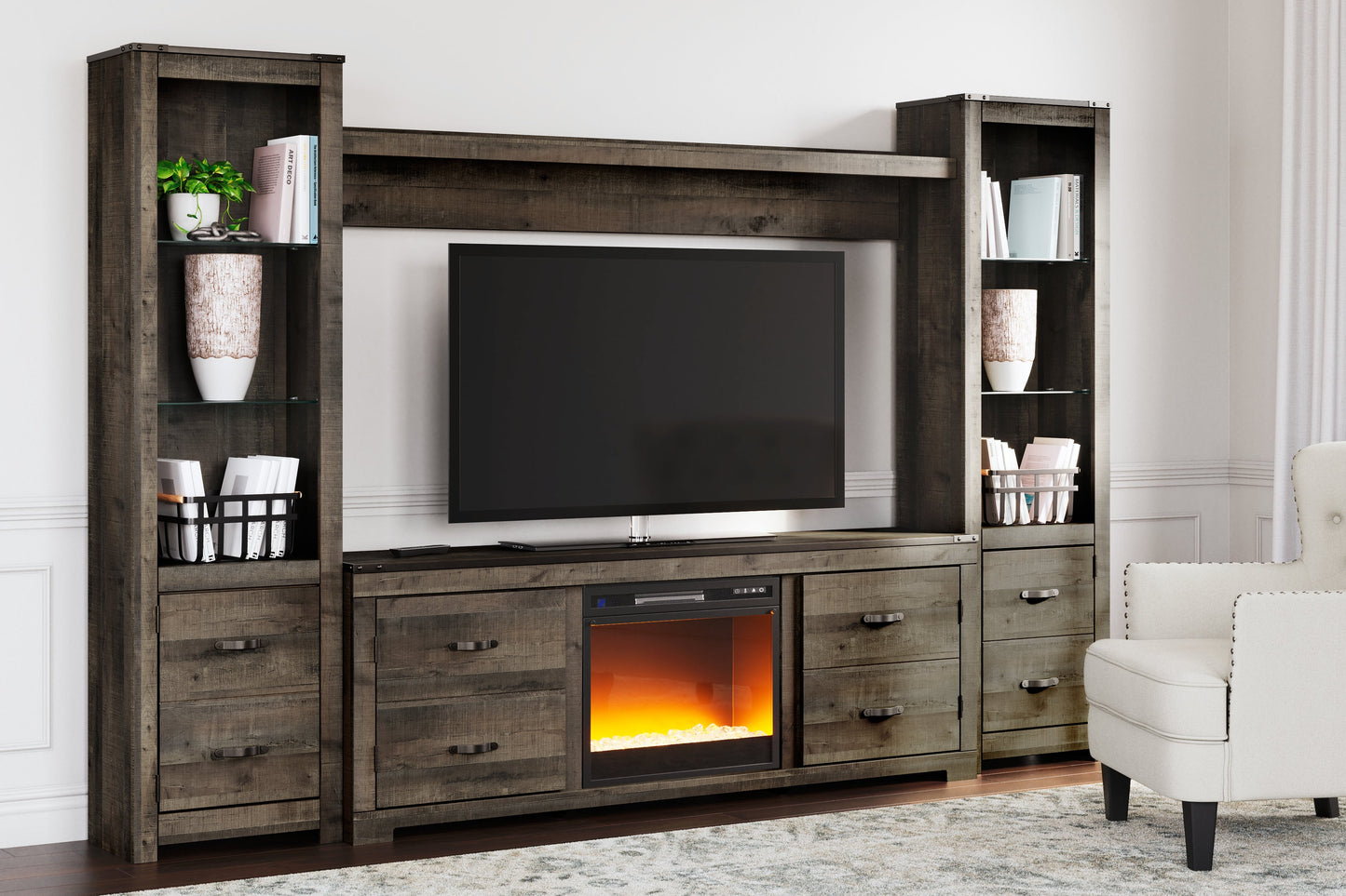 Trinell Brown 4-Piece Entertainment Center with Electric Fireplace