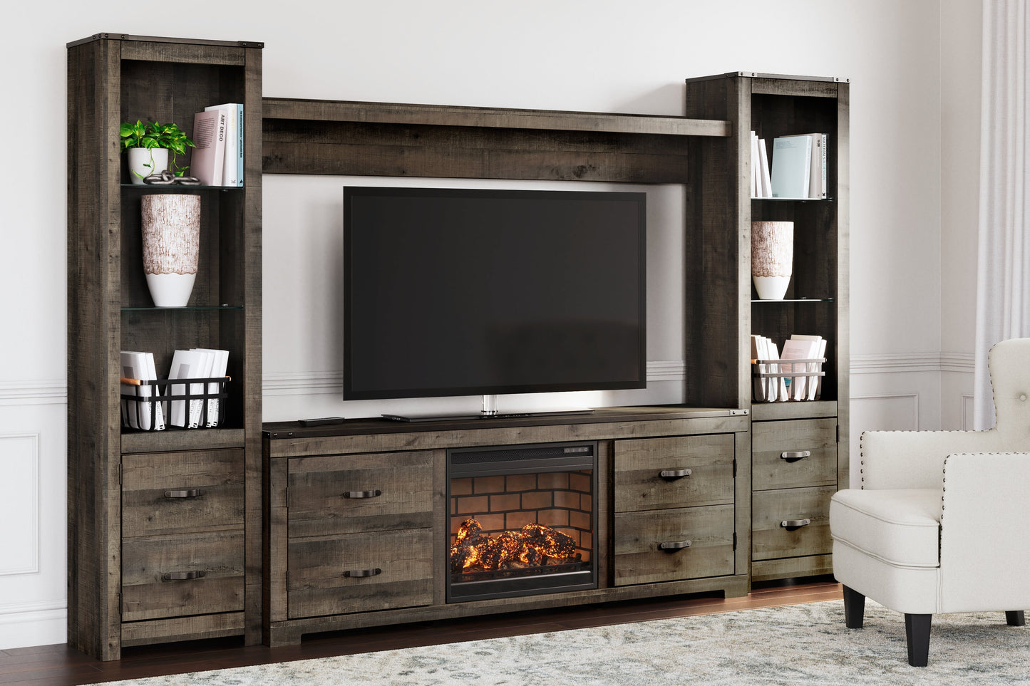 Trinell Brown 4-Piece Entertainment Center with Electric Fireplace