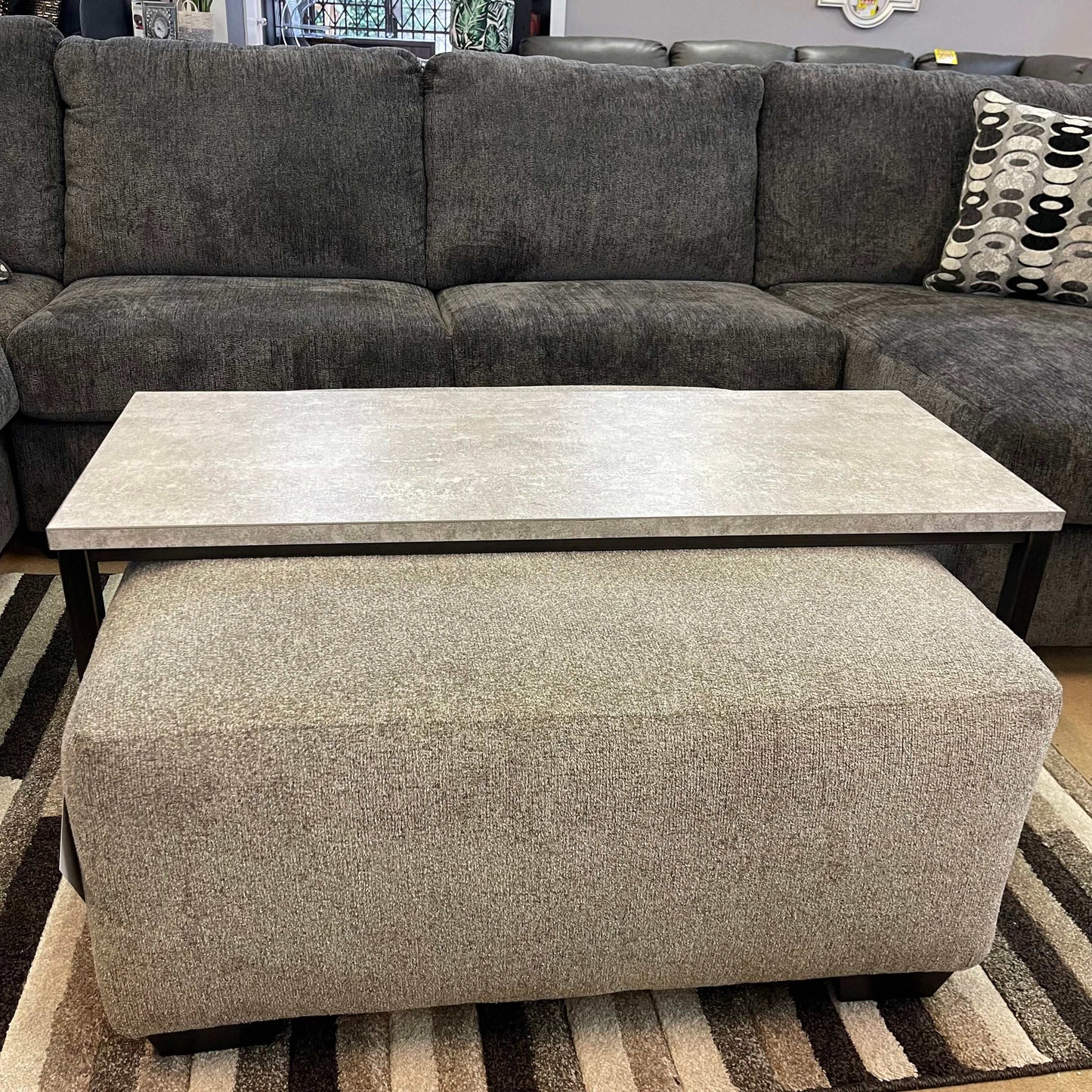 Shybourne Gray & Aged Bronze Over Ottoman Coffee Table