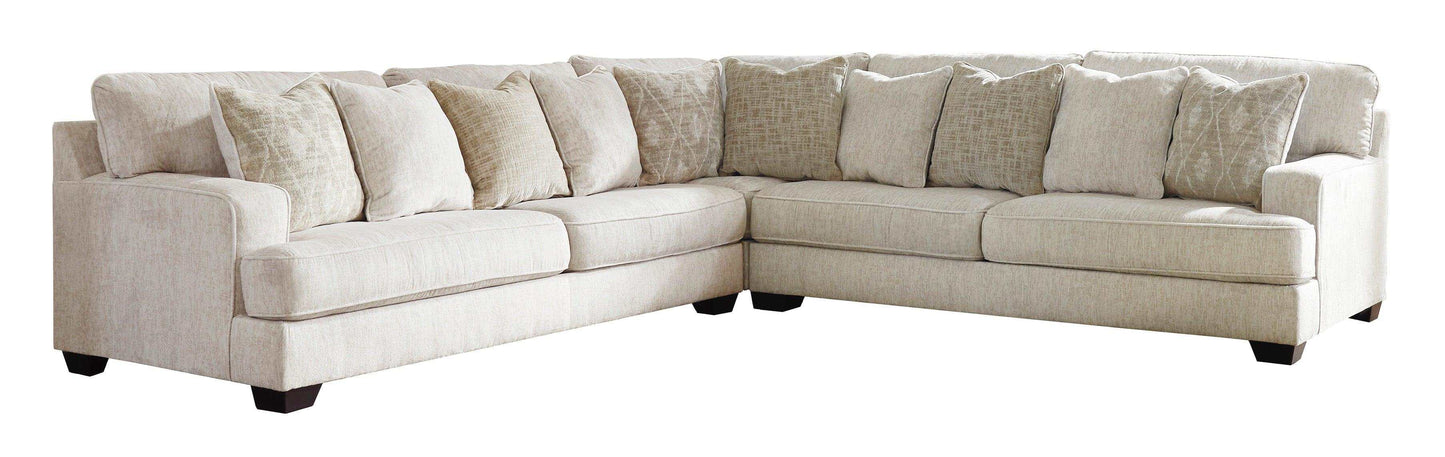 Rawcliffe Parchment 3pc Symmetrical Sectional Sofa w/ Ottoman