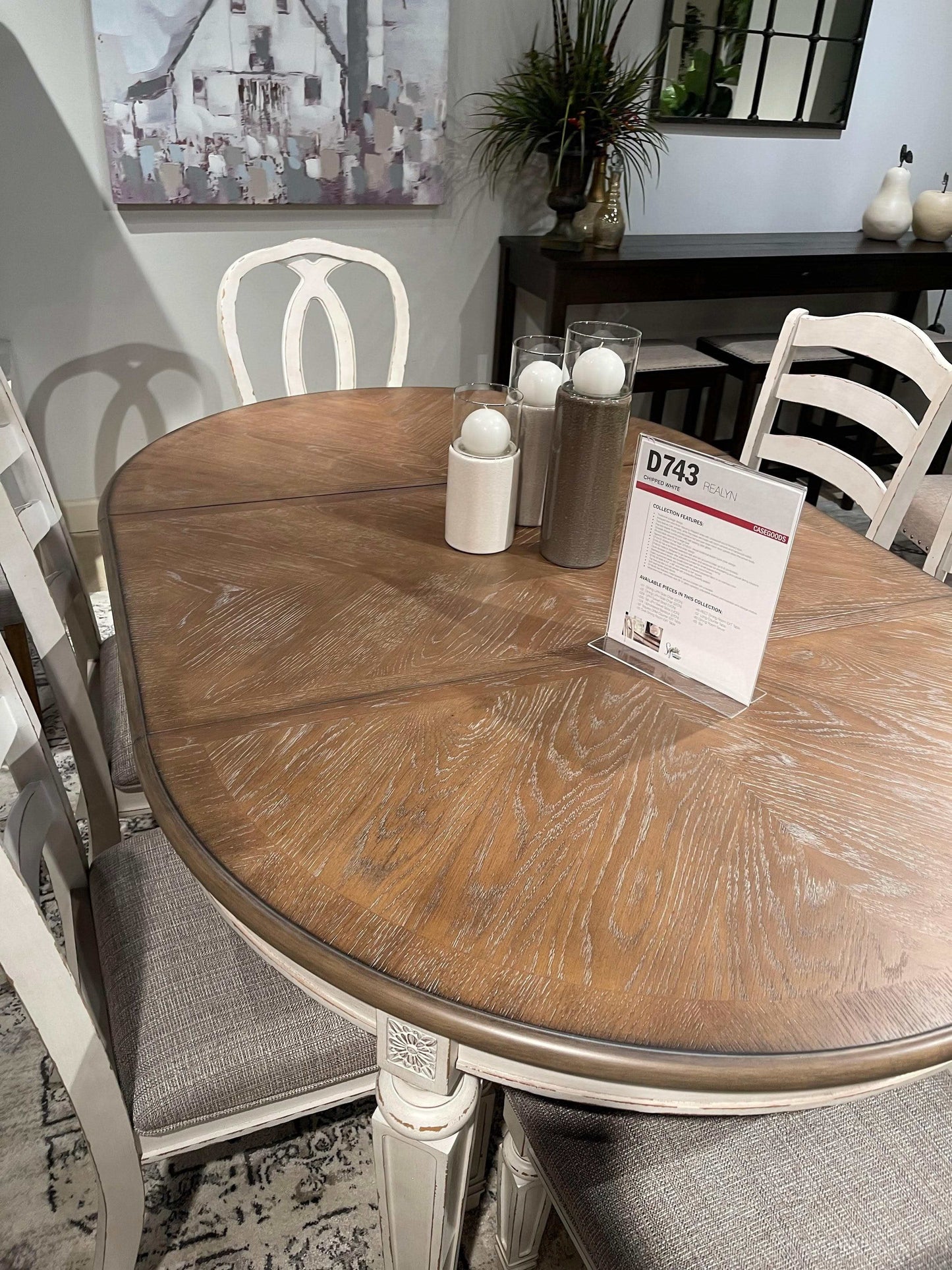 Realyn Dining Table w/ Extension Leaf