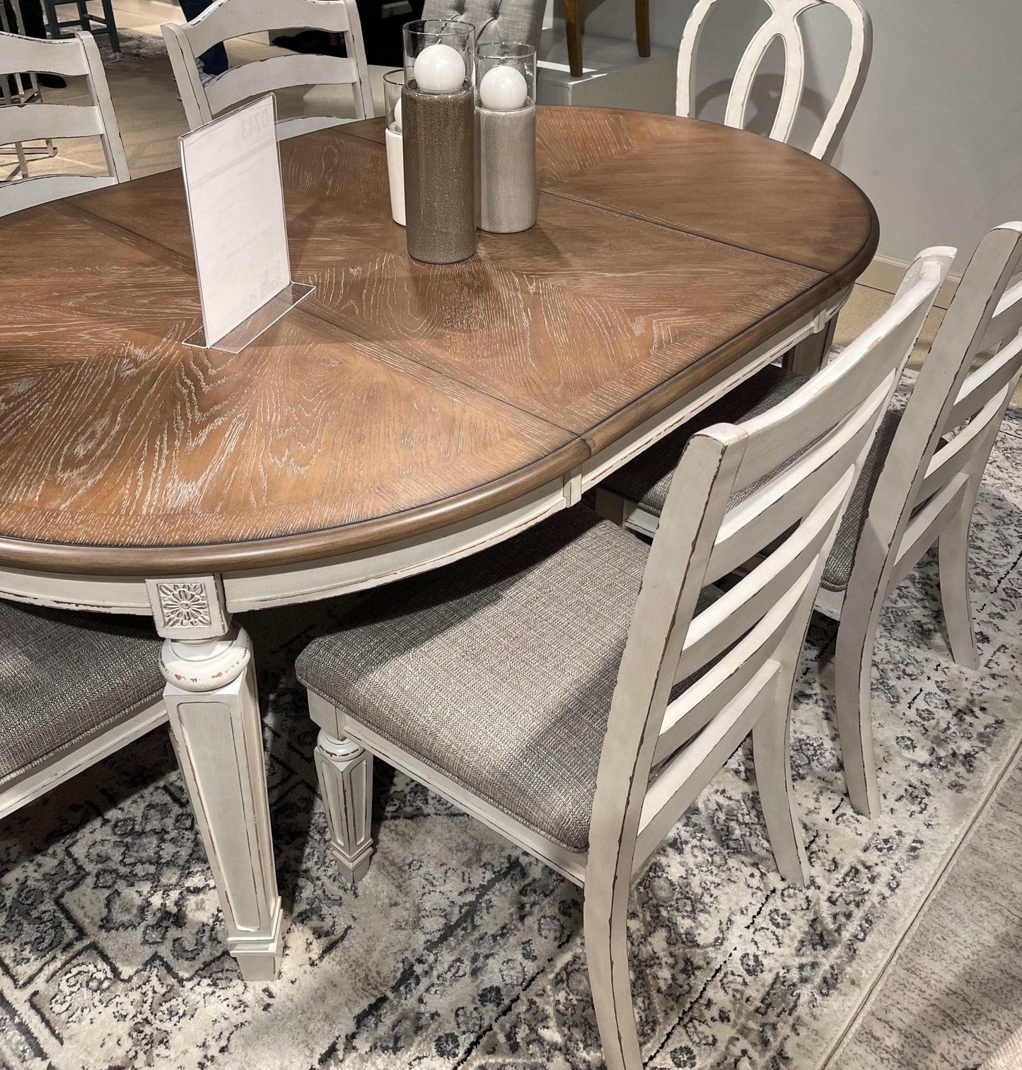 Realyn Dining Table w/ Extension Leaf