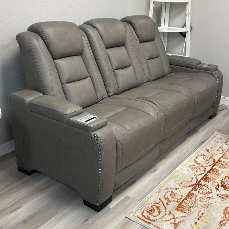 The Man-Den Gray Power Reclining Sofa & Loveseat