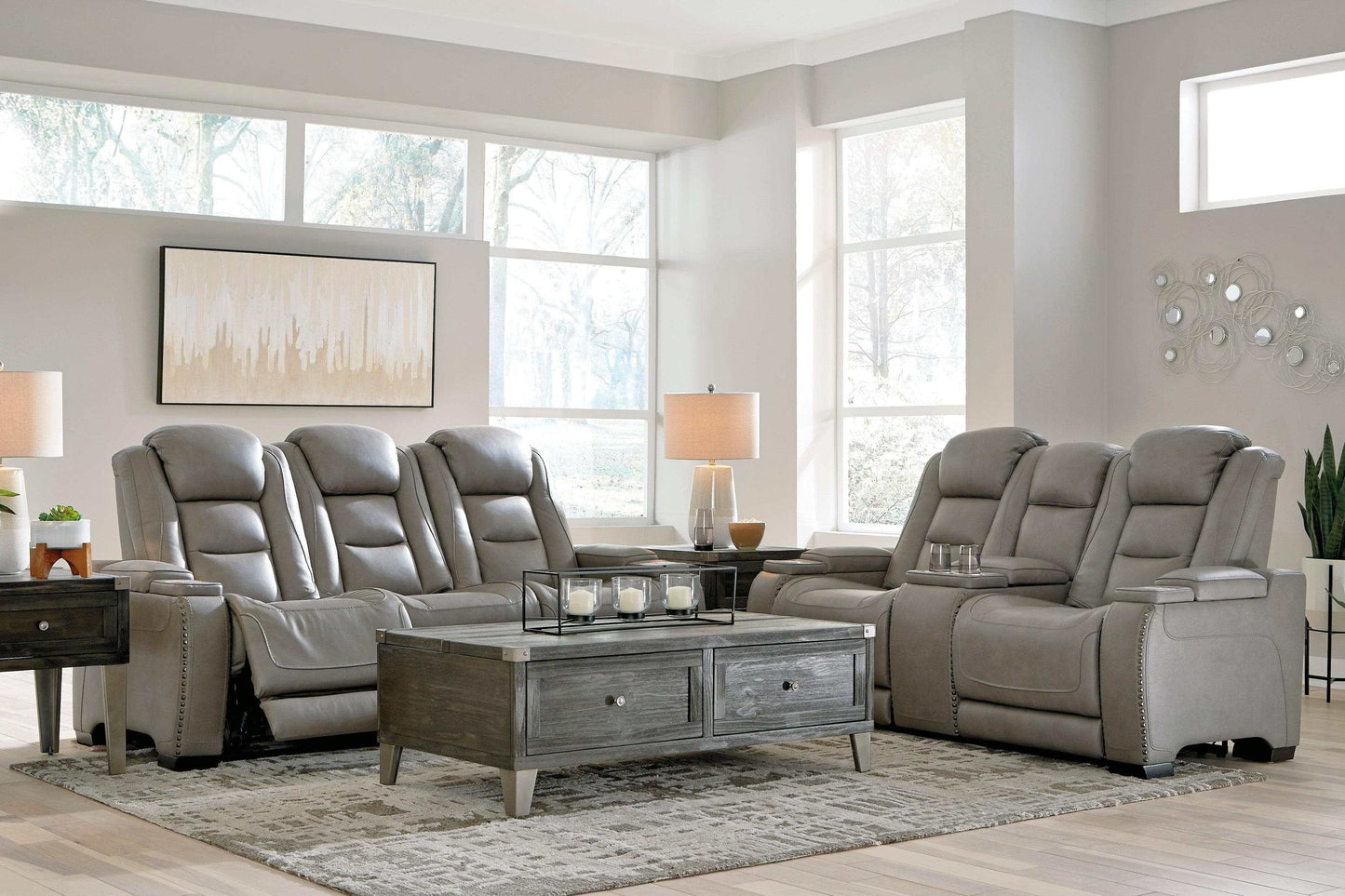 The Man-Den Gray Power Reclining Sofa & Loveseat