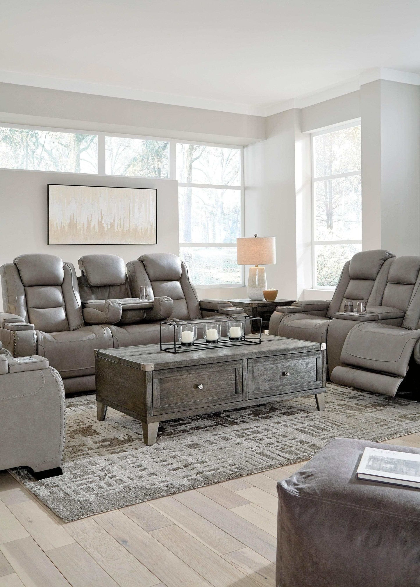 The Man-Den Gray Power Reclining Sofa & Loveseat